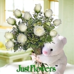 Gift a teddy bear & a bunch of white roses on this Valentine's Day